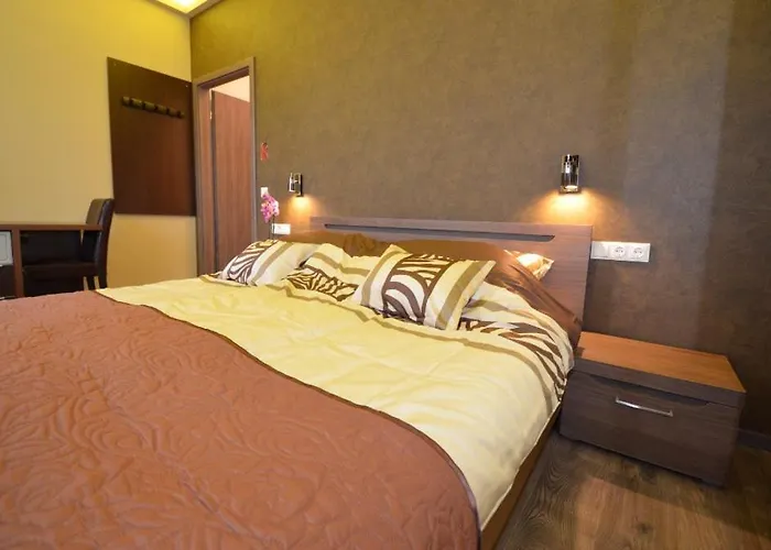 Fig Tree House Gazde/Camere de închiriat